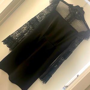 Fitted black boohoo mini dress with lace detail
